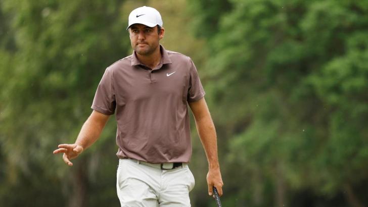 Scottie Scheffler playing golf
